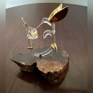 Delicate Hand Blown Glass Hummingbird with Flower mounted on wooden base.